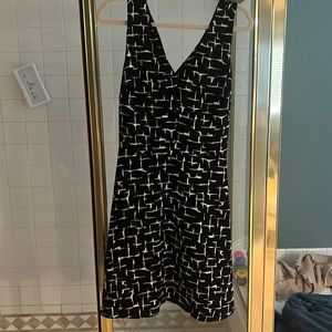 Cross back black and white a-line, new worn